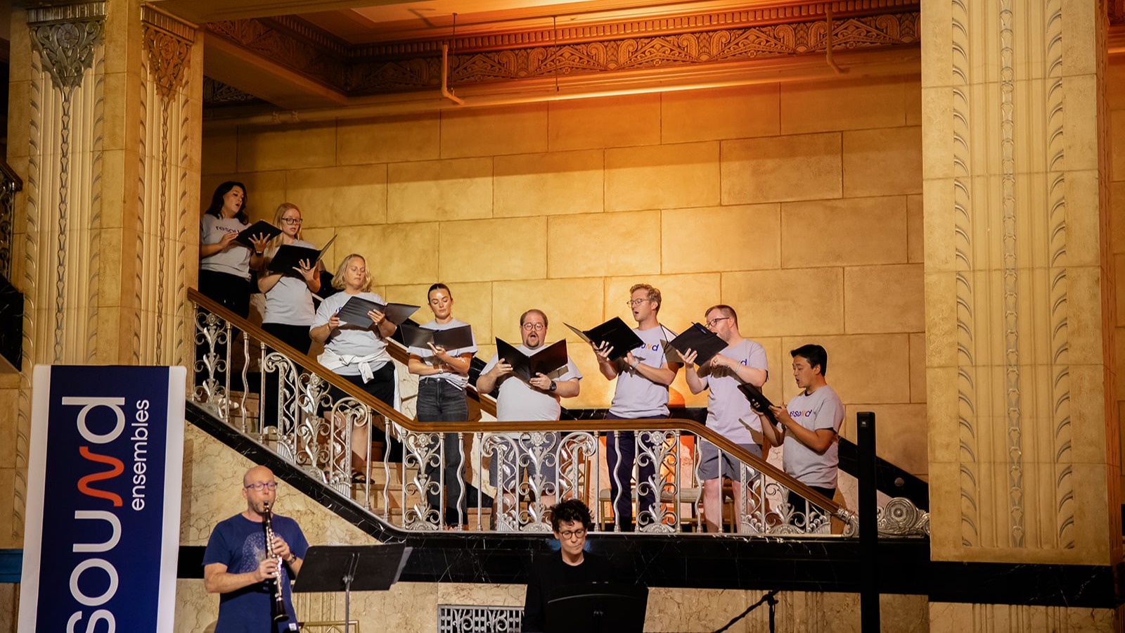Ensemble on a marble staircase