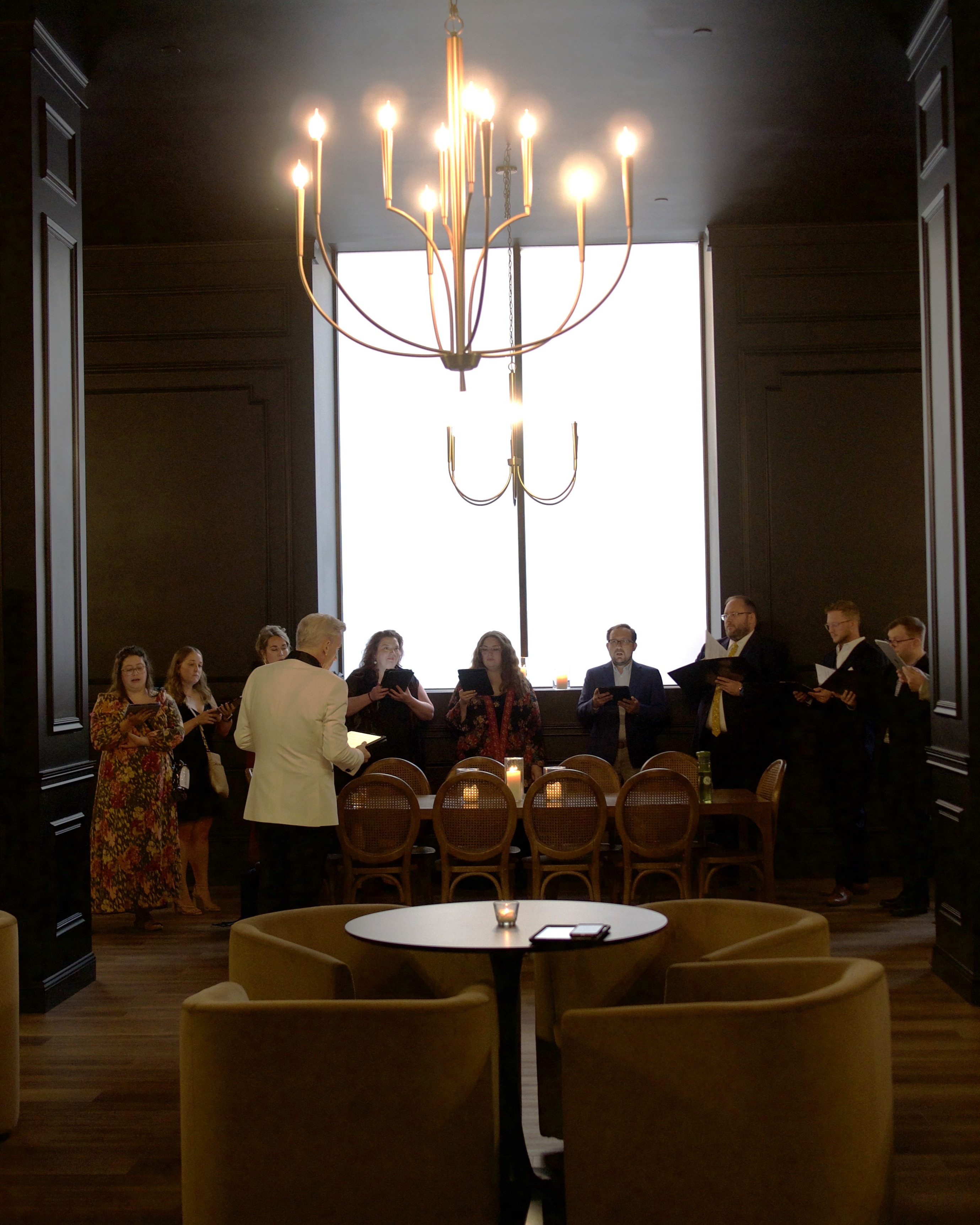 Wide shot of a noir lounge performance